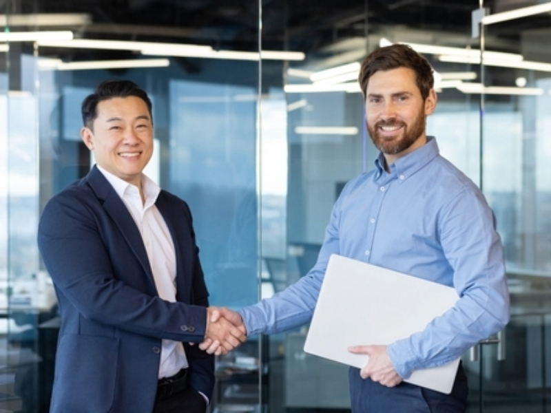 Two businessmen shaking hands